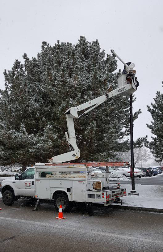 Bucket trucks replacing street lights